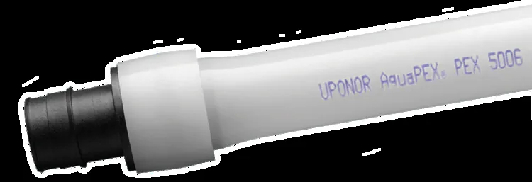 Uponor AquaPEX tubing with an expansion fitting, from our Coto de Caza guide: Water Softener Installation